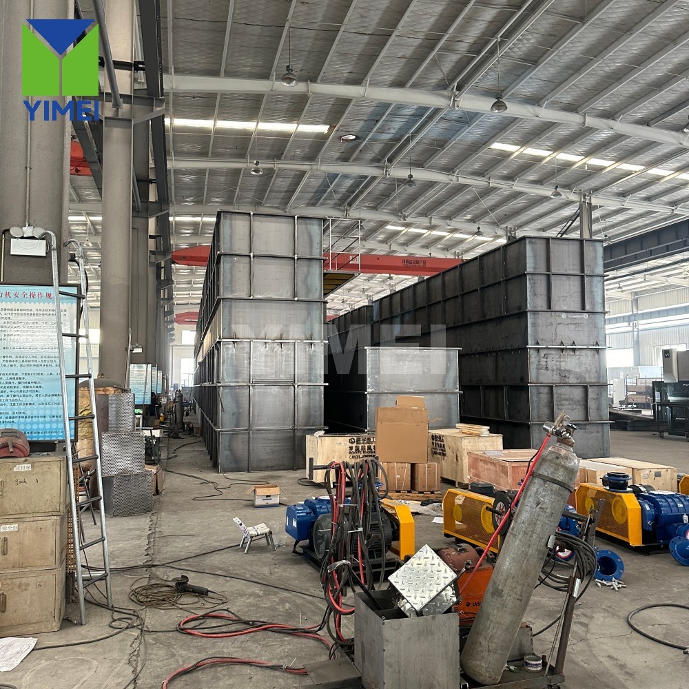Factory team pre‑installing piping and components