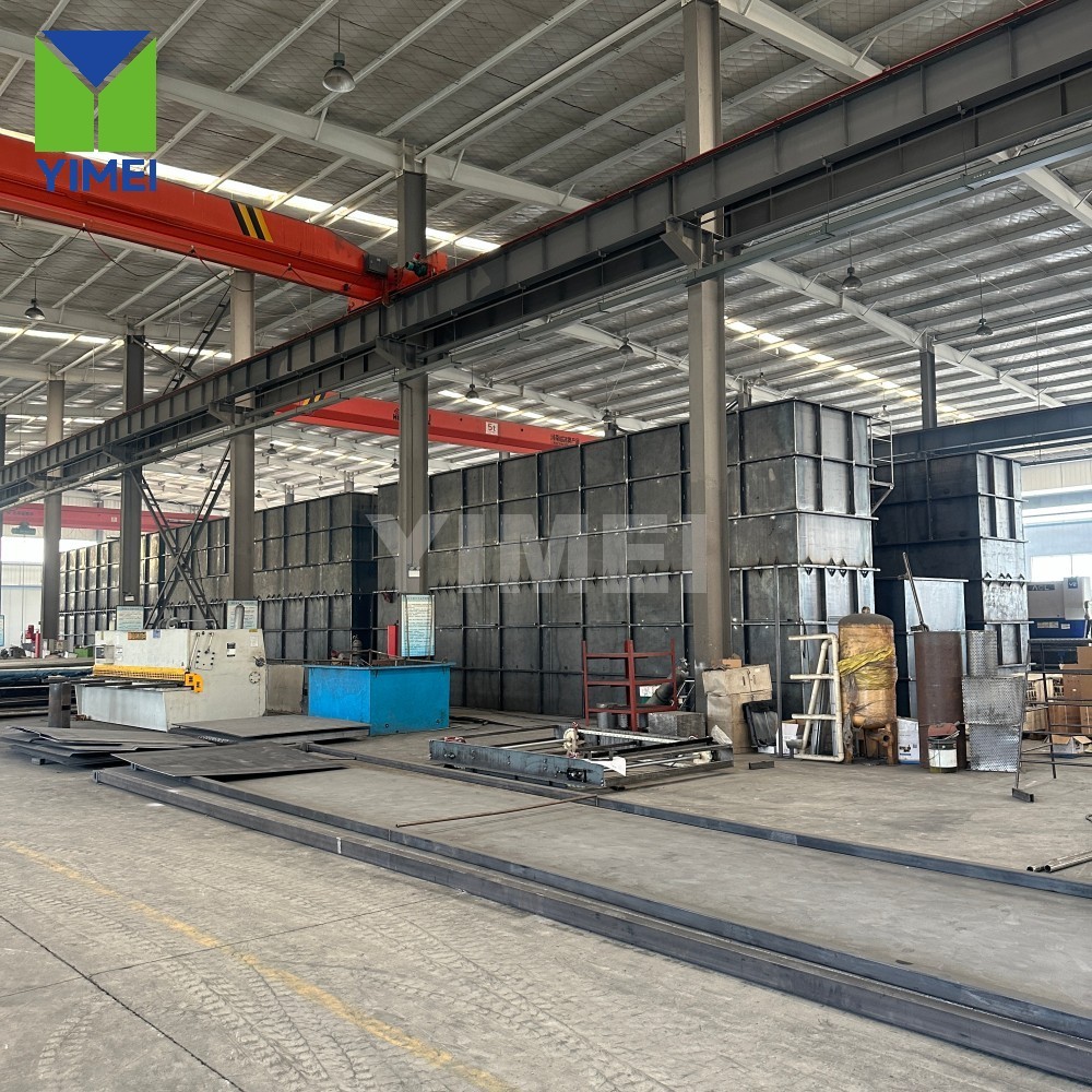 Factory team pre‑installing piping and components